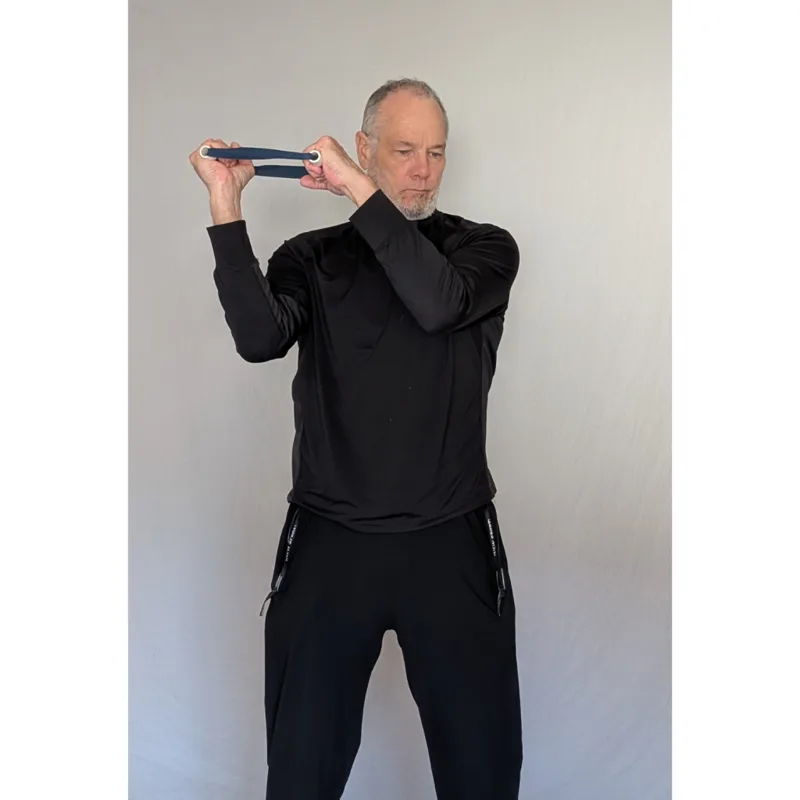 Van demonstrating Windshield Wipers, one arm pulling against the other through the strap